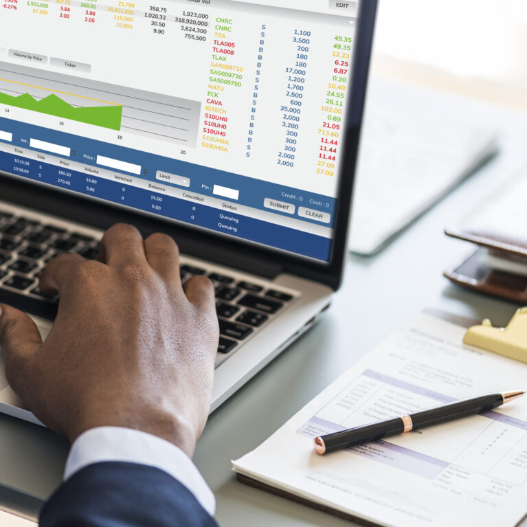 Black businessman using computer laptop